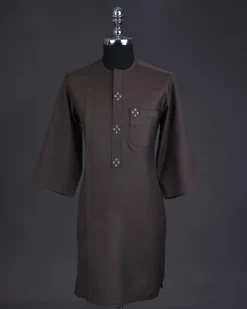 An Uber brown, front flap with connected stars, 3/4 sleeve African senator kaftan native.