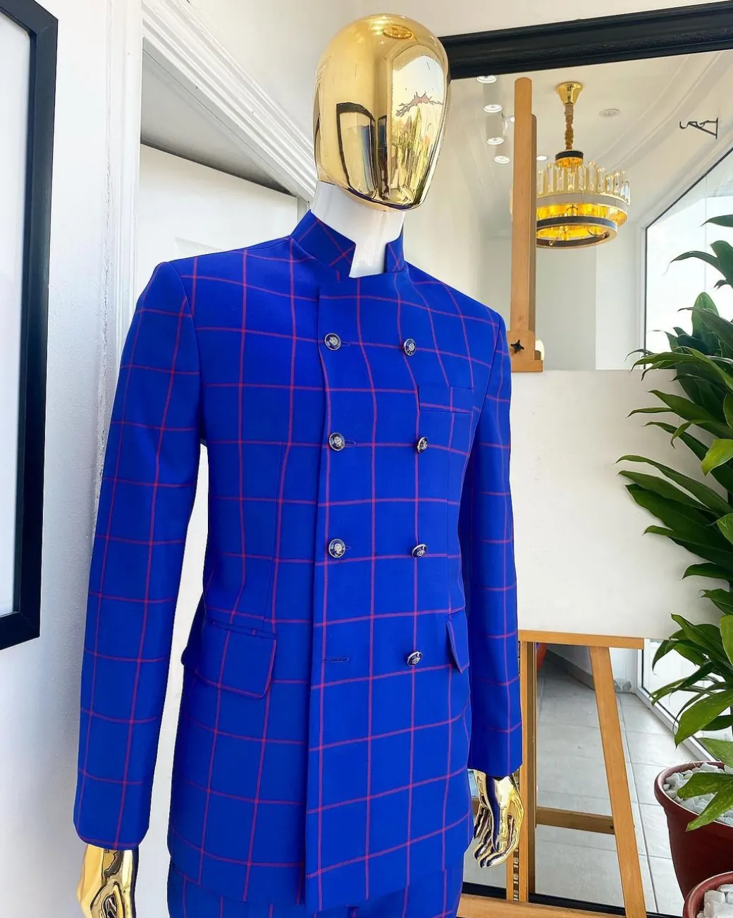 An Ultramarine blue and candy red “preachers” double breasted safari suit