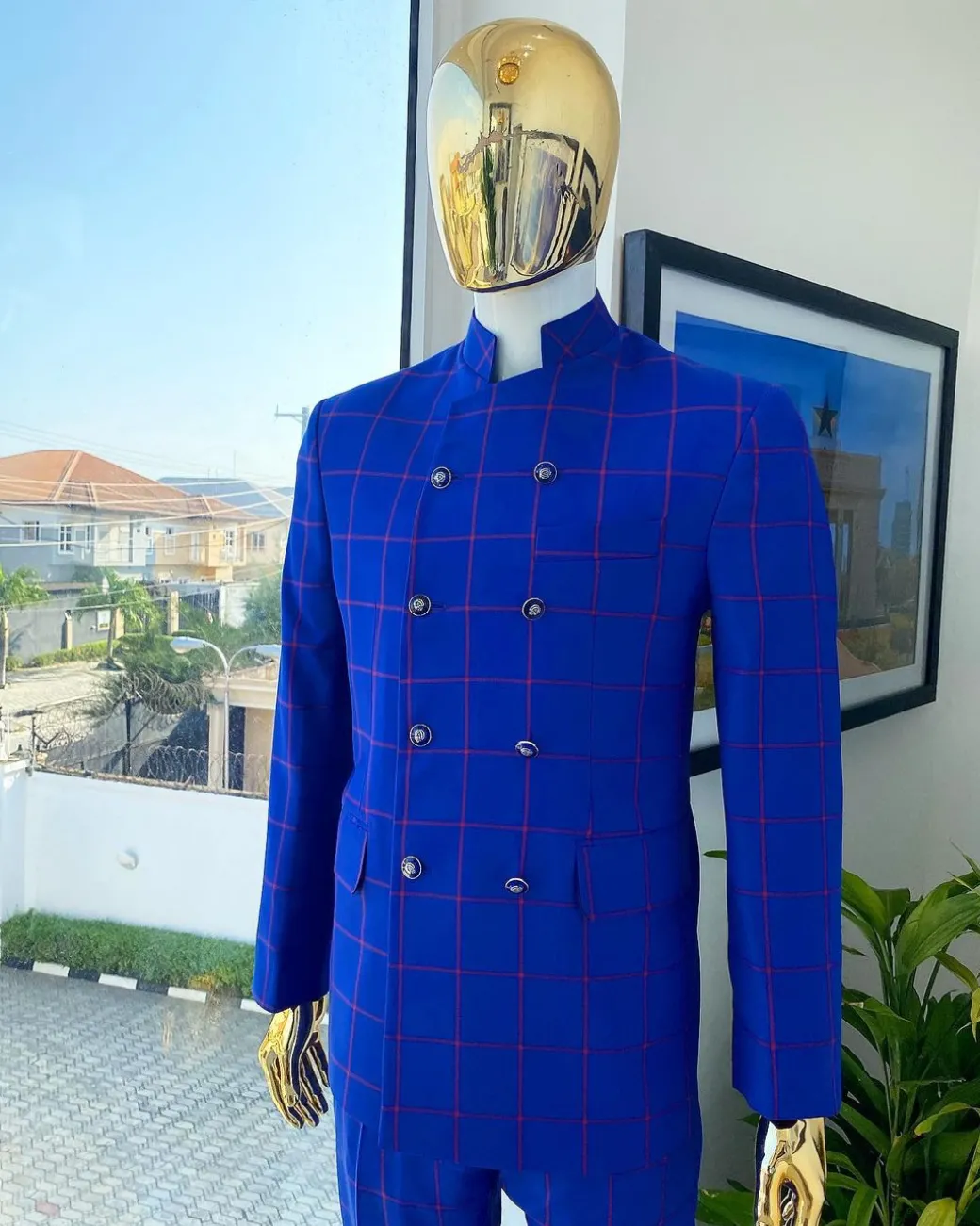 An Ultramarine blue and candy red “preachers” double breasted safari suit