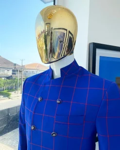 An Ultramarine blue and candy red “preachers” double breasted safari suit