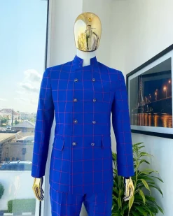 An Ultramarine blue and candy red “preachers” double breasted safari suit