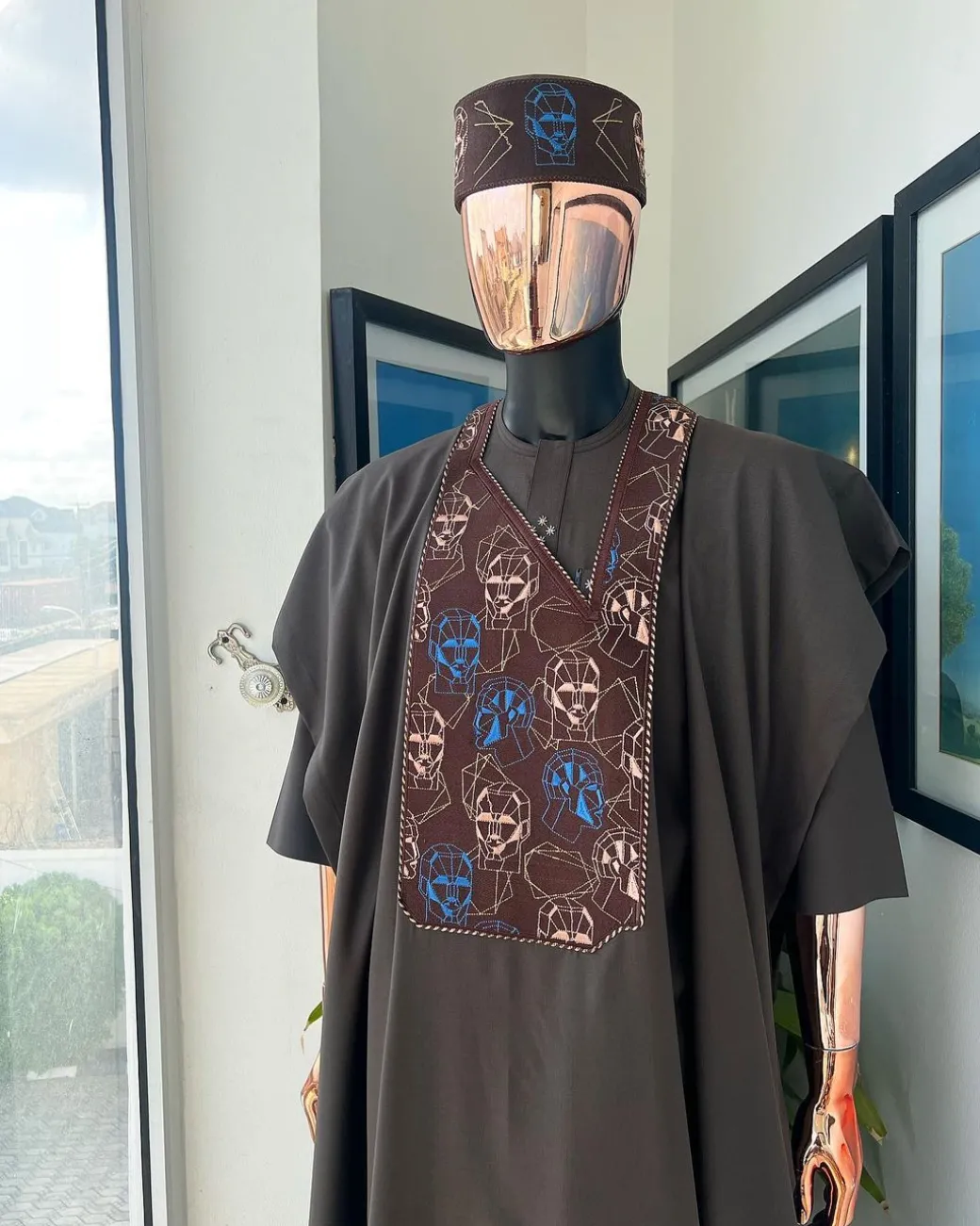 An Umber Brown, AI connected iron-man maze embroidery details agbada, mixed Swarovski buttons on 3/4 sleeve kaftan & sokoto