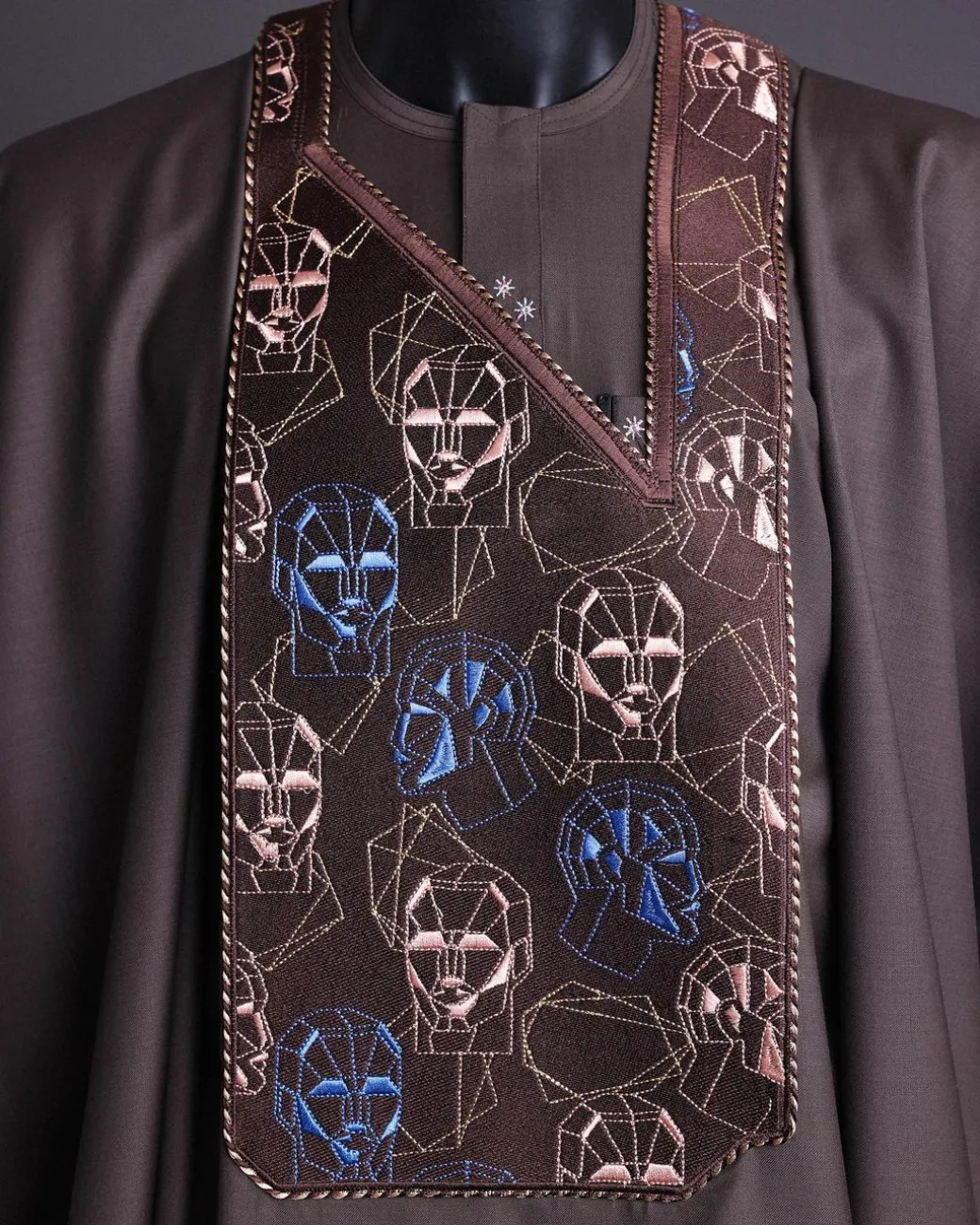 An Umber Brown, AI connected iron-man maze embroidery details agbada, mixed Swarovski buttons on 3/4 sleeve kaftan & sokoto