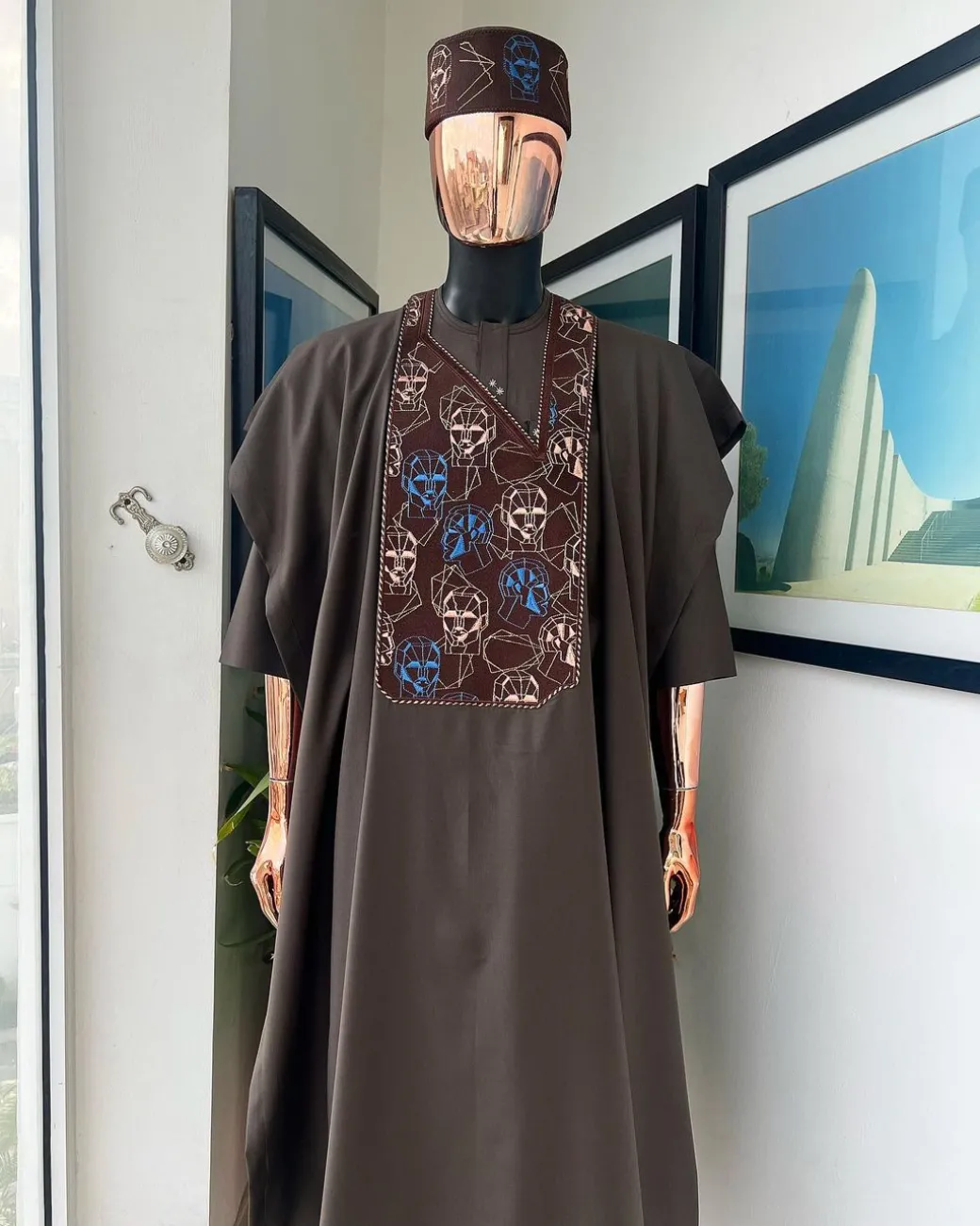 An Umber Brown, AI connected iron-man maze embroidery details agbada, mixed Swarovski buttons on 3/4 sleeve kaftan & sokoto