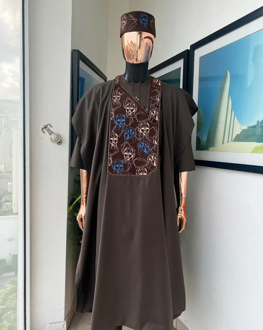 An Umber Brown, AI connected iron-man maze embroidery details agbada, mixed Swarovski buttons on 3/4 sleeve kaftan & sokoto