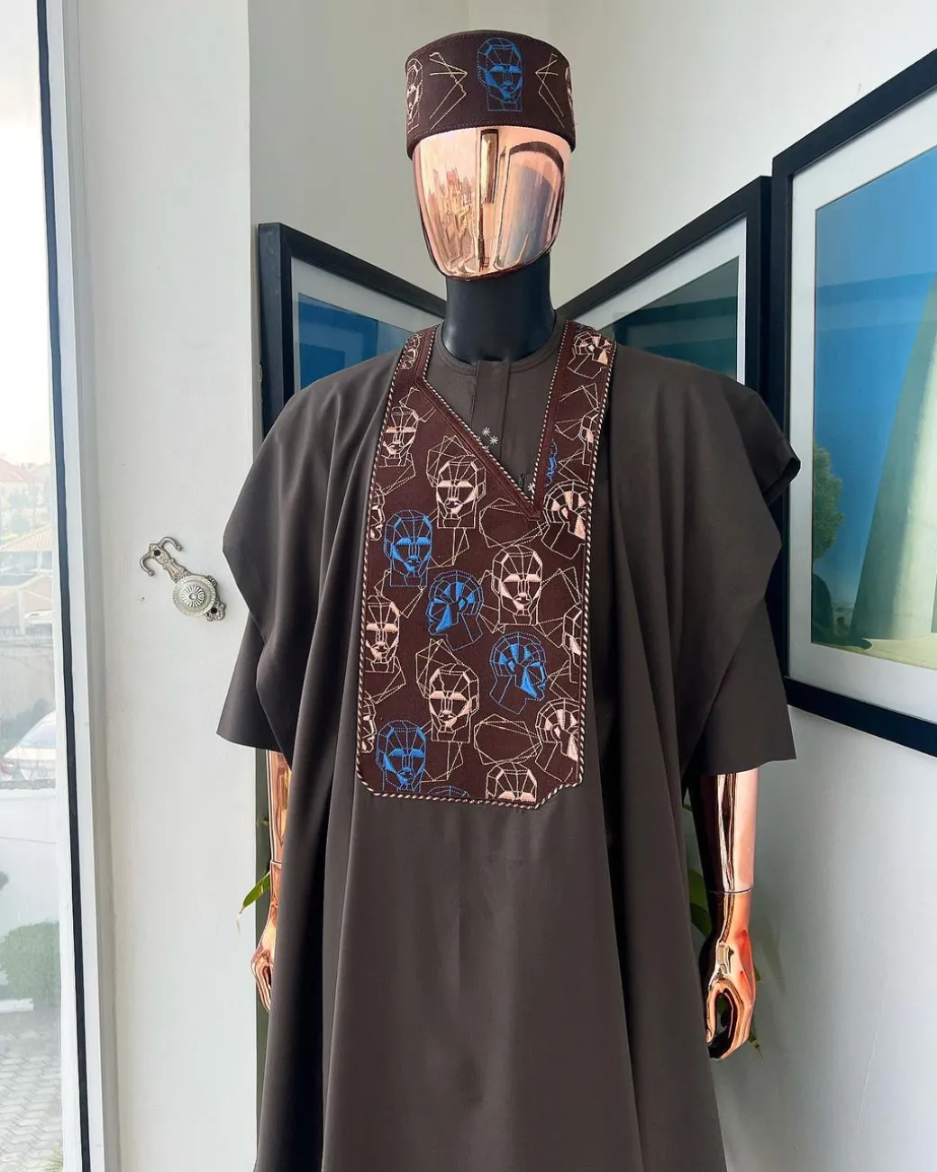 An Umber Brown, AI connected iron-man maze embroidery details agbada, mixed Swarovski buttons on 3/4 sleeve kaftan & sokoto