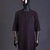 An Umber brown, connected flap and combat pocket with black lines, black Swarovski button detailing kaftan and Sokoto