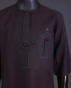 An Umber brown, connected flap and combat pocket with black lines, black Swarovski button detailing kaftan and Sokoto