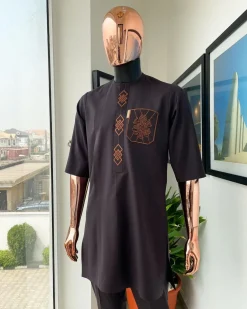 An umber brown, 3D precision anchor embroidery flap and pocket detailing African traditional senator Kaftan native
