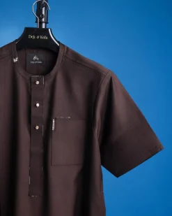An Umber brown, Nobility fabric, front flap, short sleeve and gold details Swarovski button African senator kaftan native.