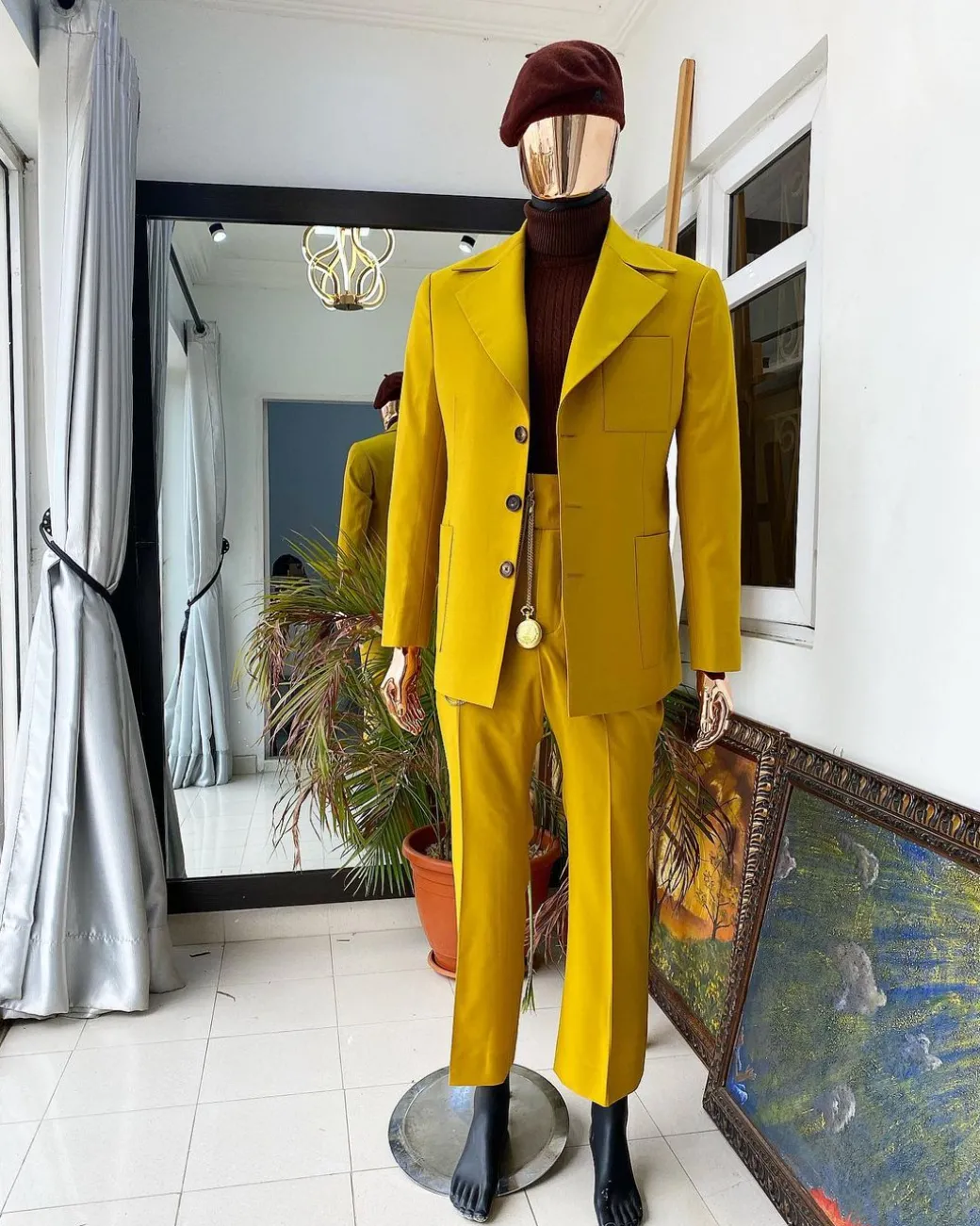 The “ Festac 77” mustard yellow 3 button safari suit