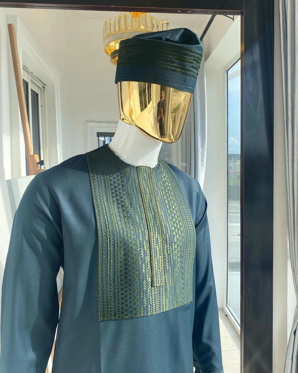 The “Chadian” front embroidery army green senator traditional kaftan with a matching design hat.