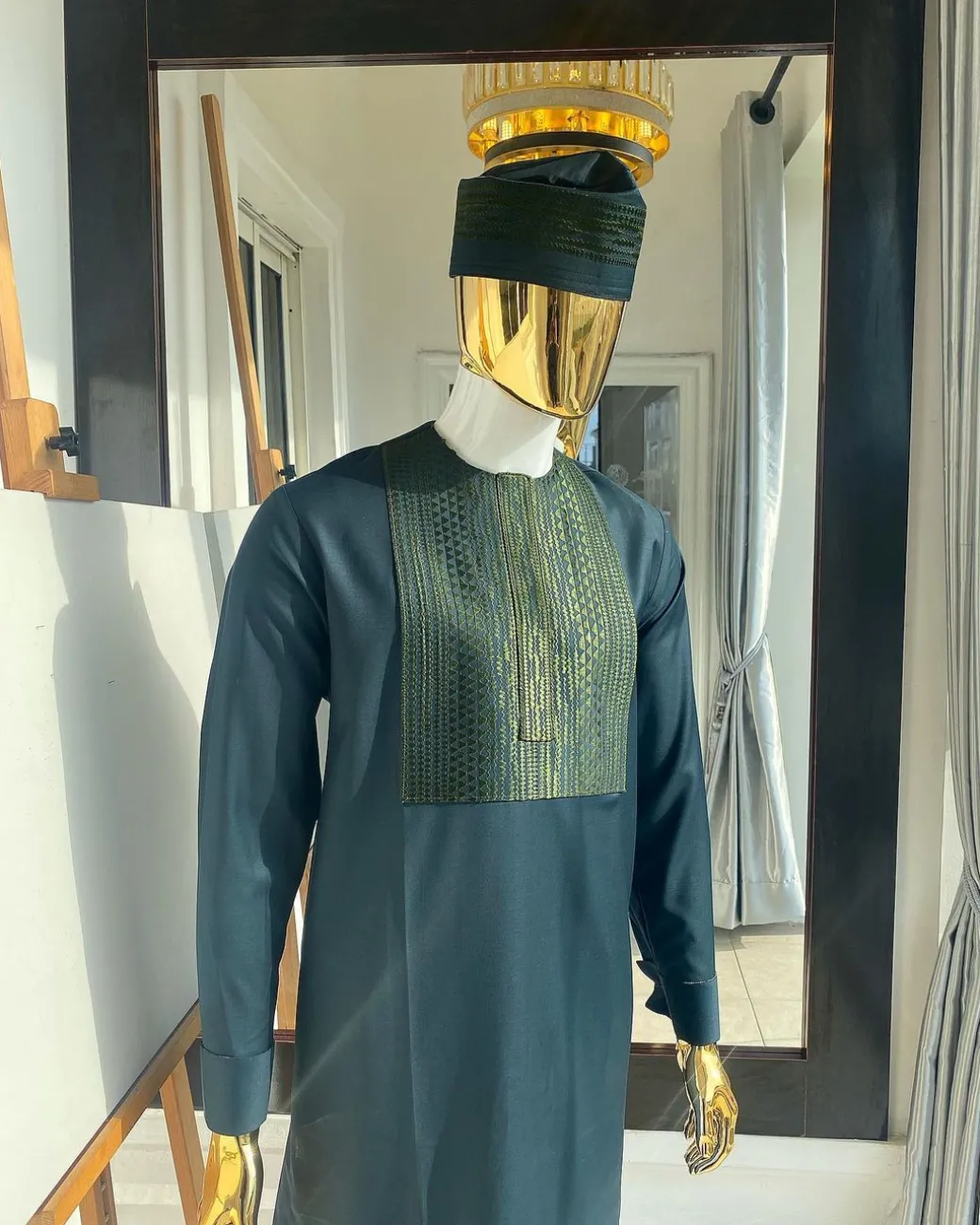 The “Chadian” front embroidery army green senator traditional kaftan with a matching design hat.