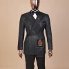 The “Da Vinci” charcoal black, metallic jacquard, single lapel, mid cut intersect strap tuxedo suit.