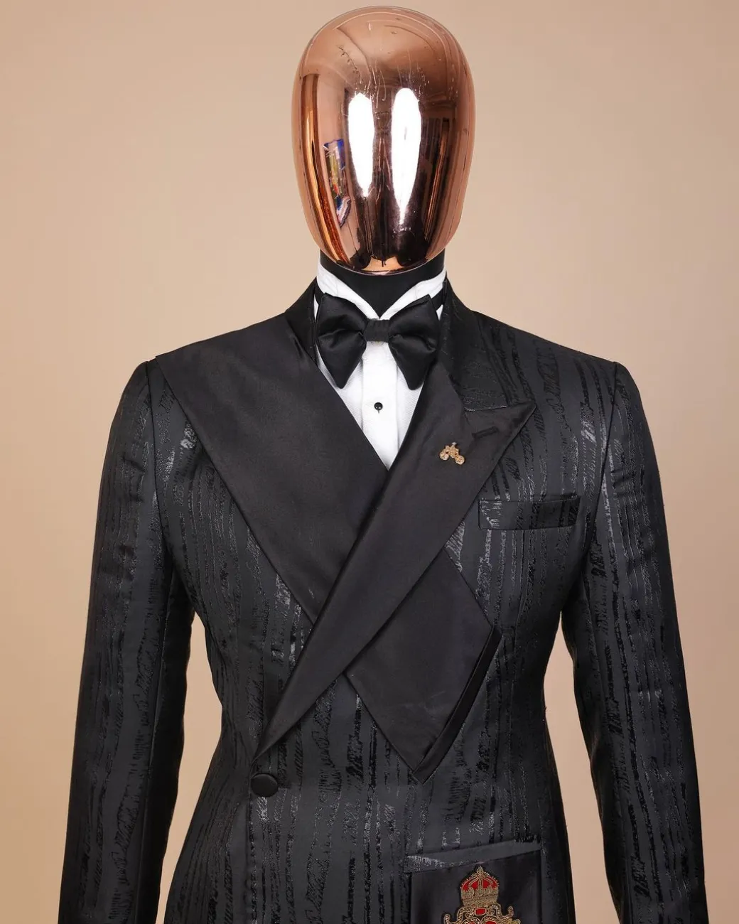 The “Da Vinci” charcoal black, metallic jacquard, single lapel, mid cut intersect strap tuxedo suit.