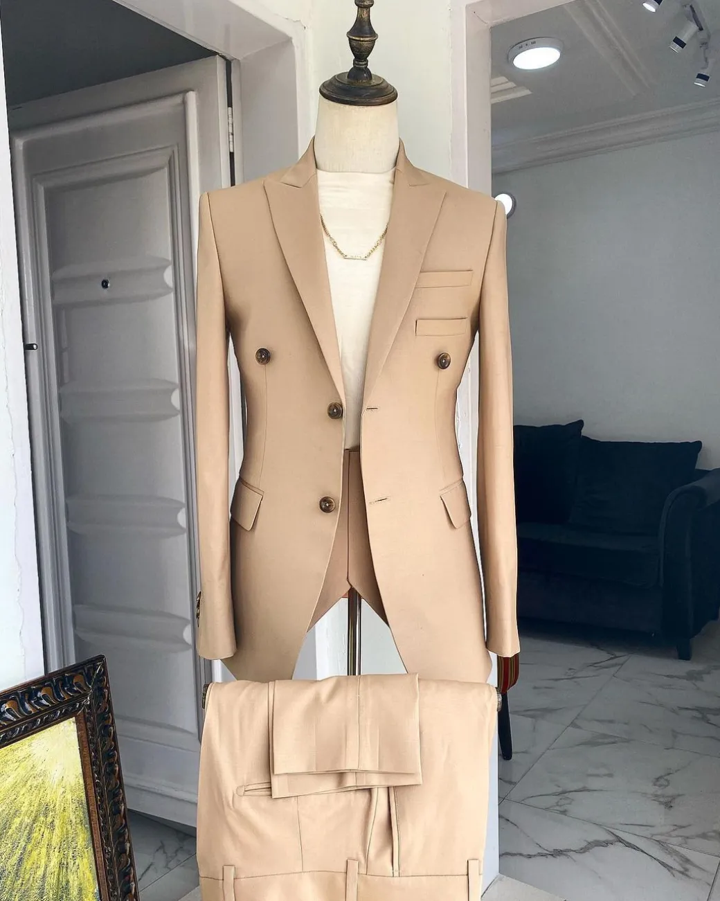 The “Diego Maradona” monochrome Champagne Gold peak lapel business suit