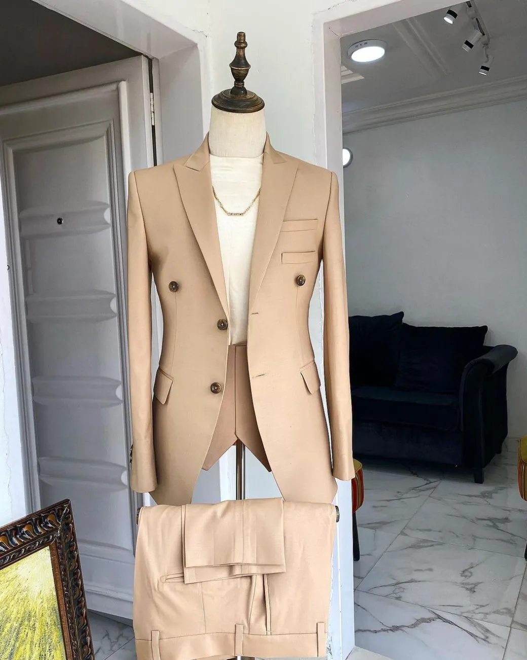 The “Diego Maradona” monochrome Champagne Gold peak lapel business suit