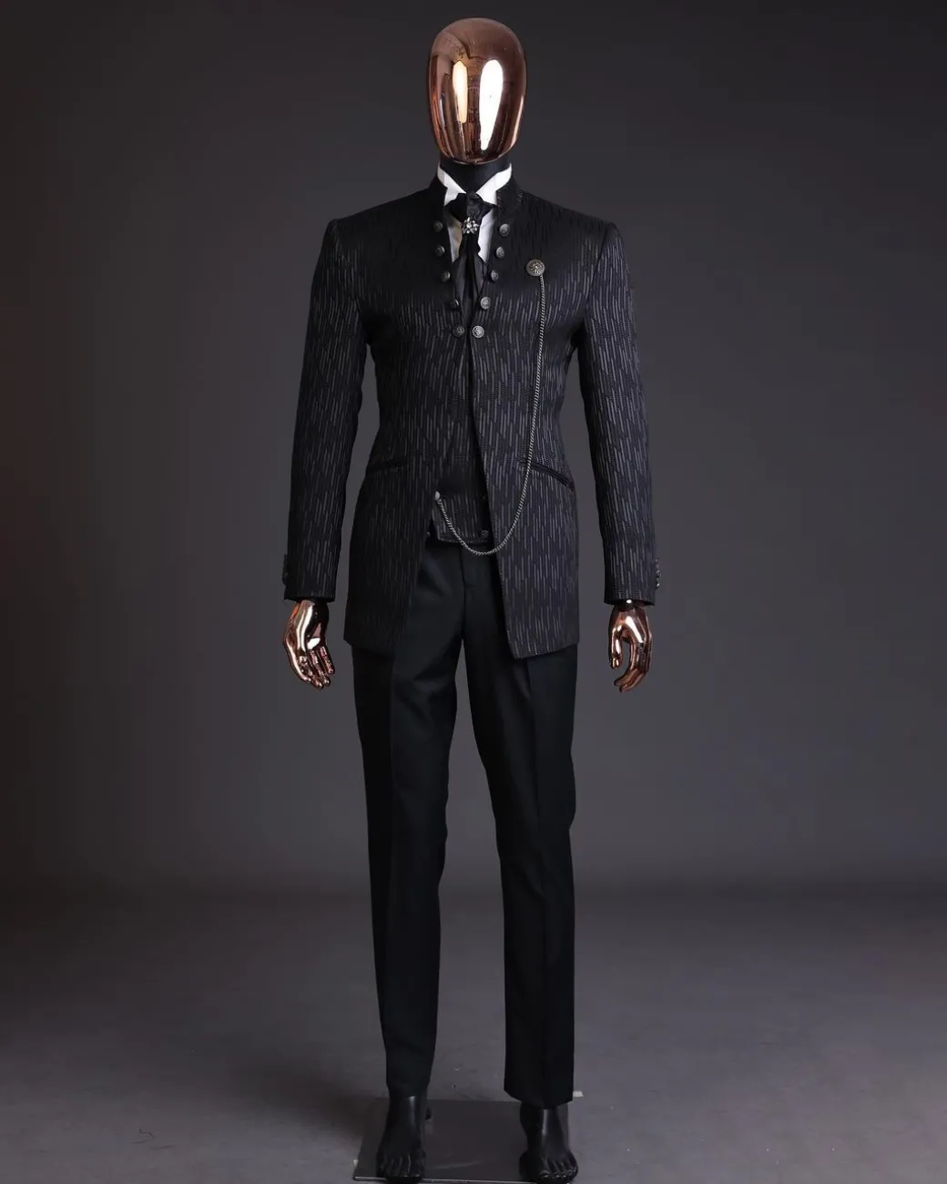 The “Ever After” charcoal black, half front cut, rectangle dropping pattern jacquard suit.