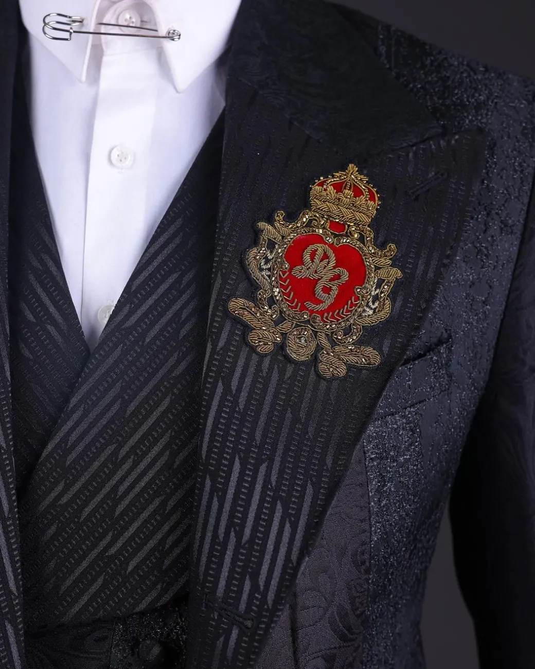 The “gogo” limited edition black mixed jacquard fabric peak lapel metallic jacquard suit