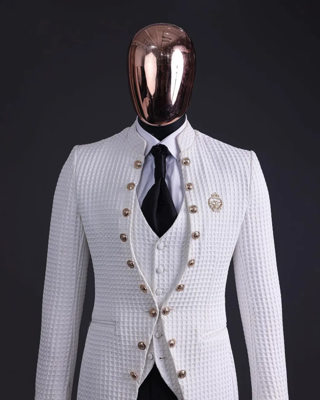 The “Monaco” ivory white plunged jacquard, single button front cut layered suit
