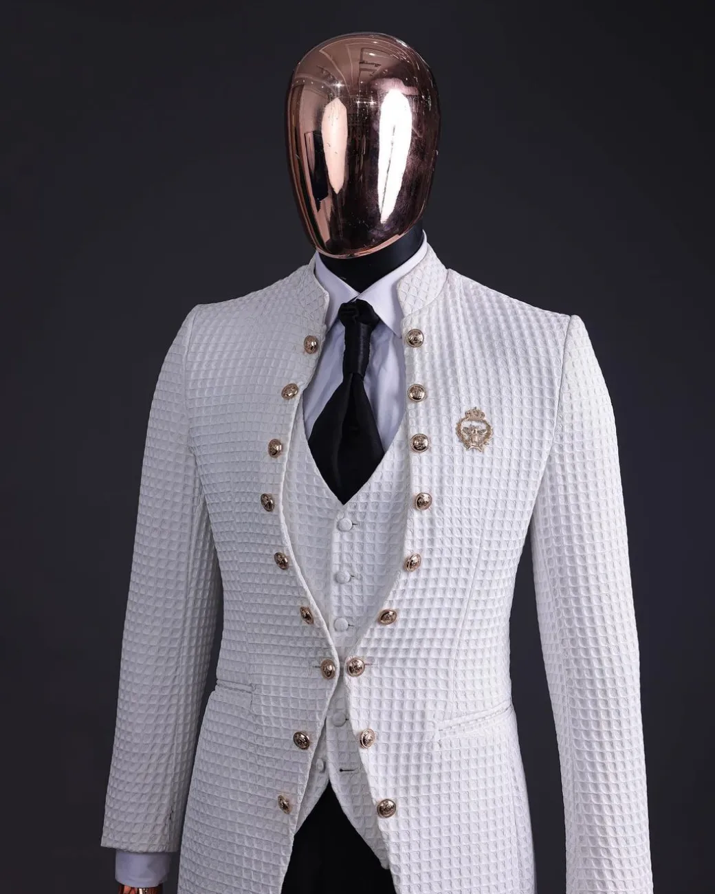 The “Monaco” ivory white plunged jacquard, single button front cut layered suit